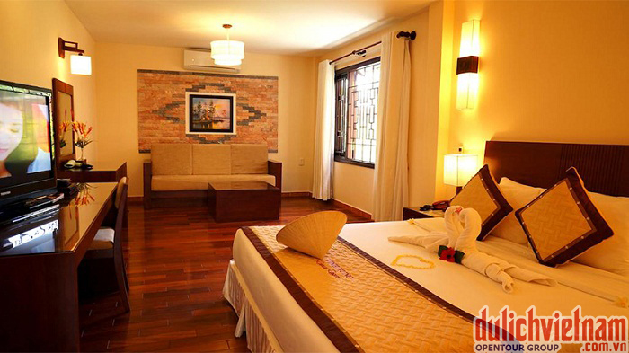 Phòng ngủ của Vĩnh Hưng Riverside Resort & Spa